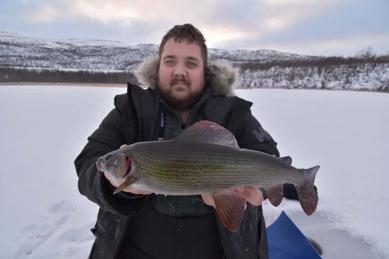 Abisko: Ice Fishing Experience - The Two-Hour Flow: Drilling, Bait, and Watching for the Bite