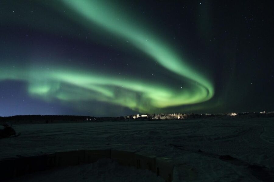 Aurora Hunt on Snowmobile - small groups - Fika by the Open Fire: Warm Up and Learn the Why