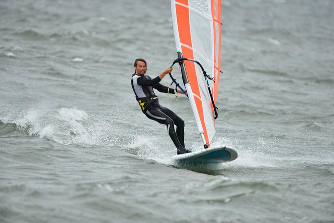 Dynamic Windsurfing Beginner class Day1 - On the water: learning with gear sized to you, plus a wetsuit and float