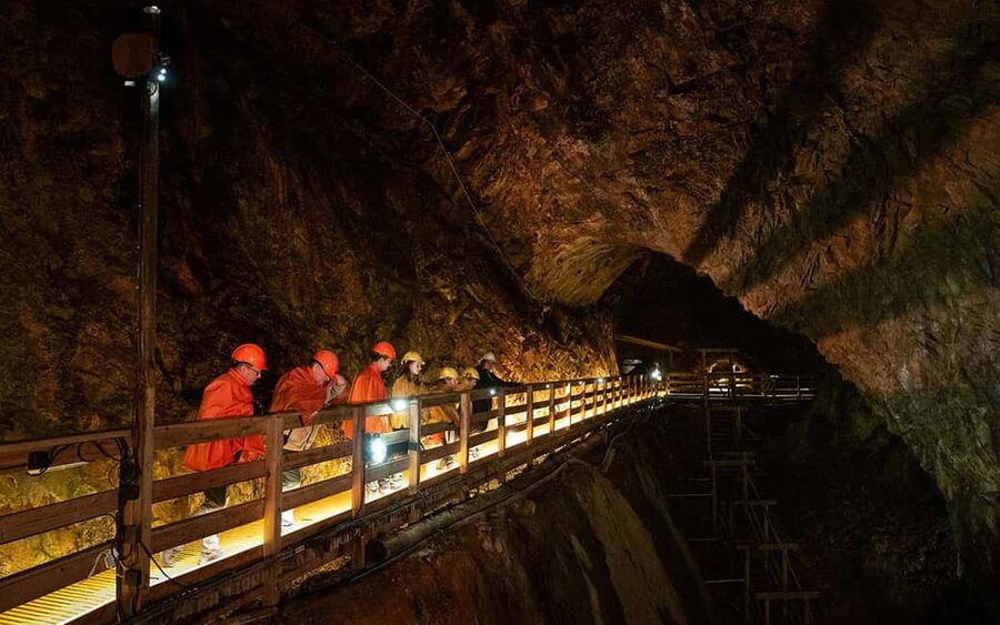 Falun: Guided tour underground of Falu Mine - The underground tour: stairs down, elevator up, and a guide leading the way
