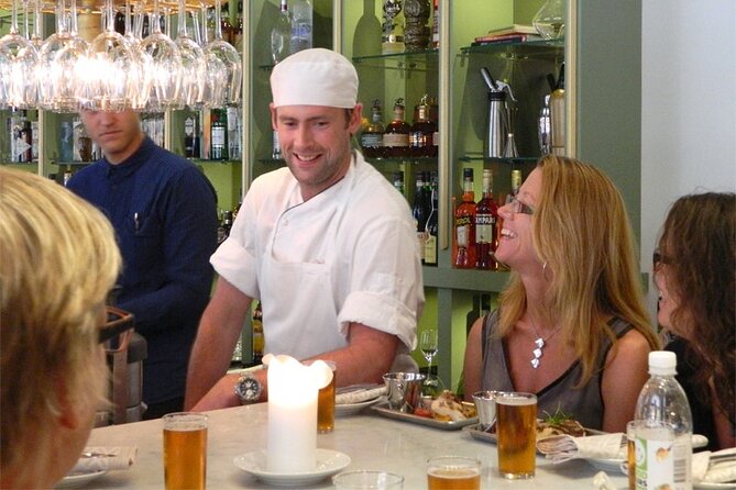 Guided Swedish Food Walking Tour in Stockholm - Stop 1 in Södermalm: seafood, fishing traditions, and pickled herring