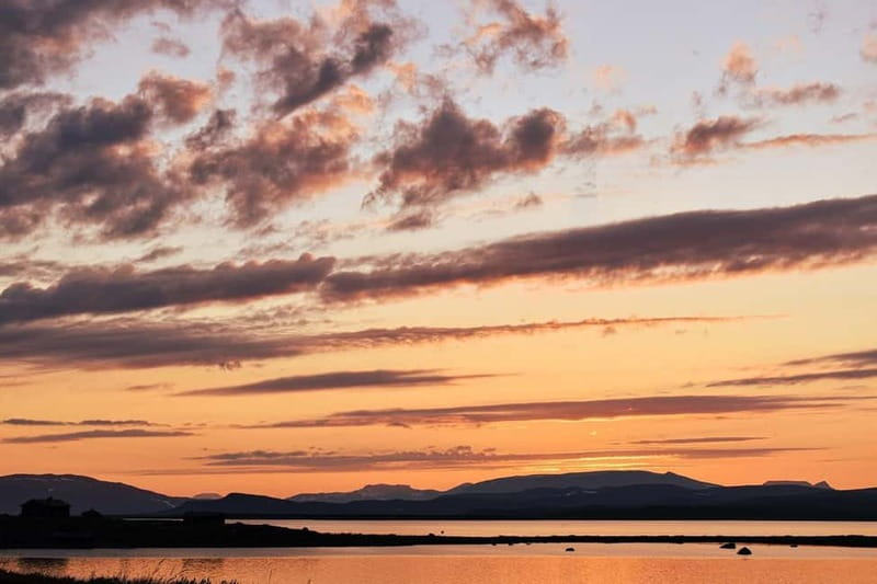 Kiruna: Arctic Summit Views in the Midnight Sun - The chairlift ride: floating above Lake Torneträsk