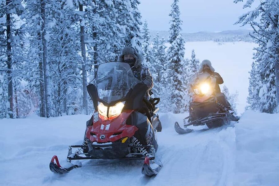 Kiruna: Guided Snowmobile Tour with Lunch - The 4-hour plan: pickup, briefing, riding, and lunch in Väkkäräjärvi