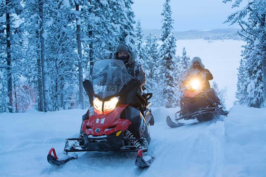 Kiruna: Overnight Snowmobile Tour with Dinner and Sauna - Kiruna snowmobiling, but with a real night built in