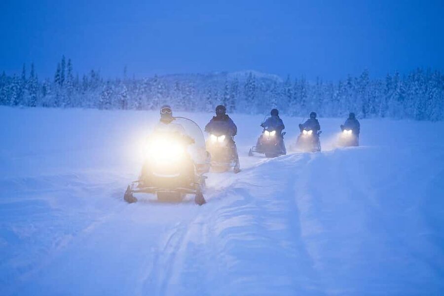 Kiruna: Overnight Snowmobile Tour with Dinner and Sauna - From pickup to departure: what to plan for before 15:00