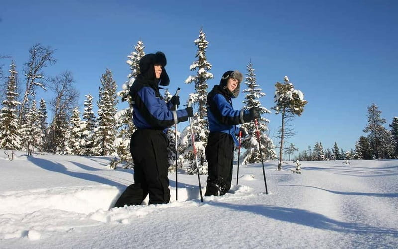 Kiruna: Snowshoe Trek with Warm Beverage and Sandwich - Gear Fitting With Warm Overalls, Boots, Snowshoes, and Poles