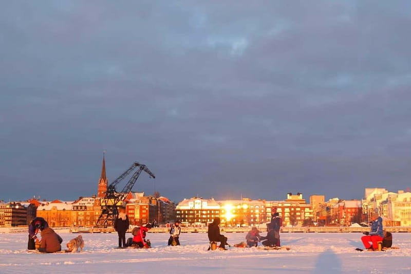 Lulea: Ice Fishing Tour in the heart of the city with Guide - The guided ice fishing lesson: drill, lure, and wait