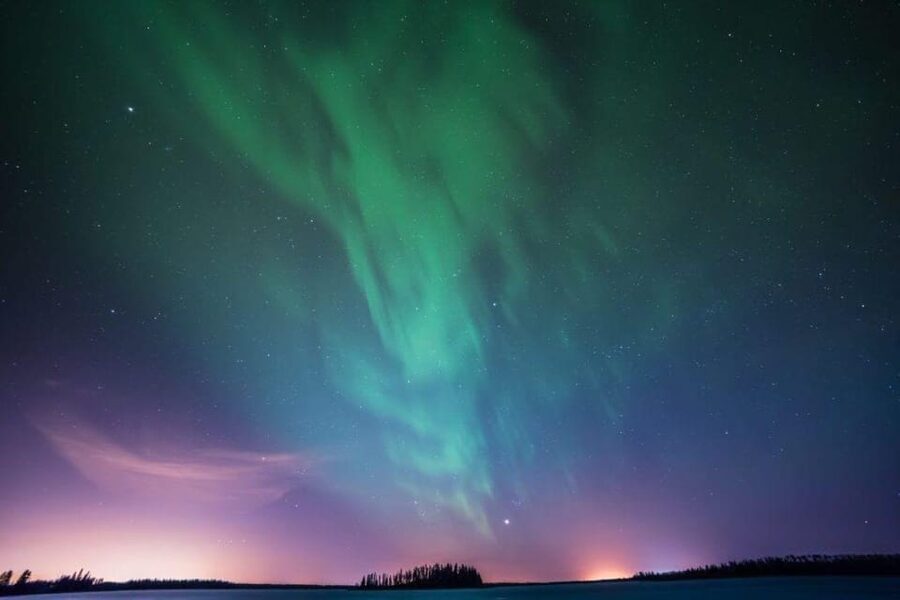 Luleå: Snowmobile Adventures & Northern Lights Hunt - The snowmobile ride: sharing the machine and chasing the darkest skies