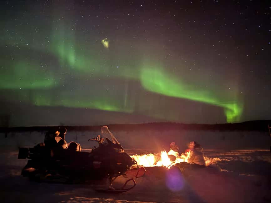 Överkalix - Lapland : Snowmobile Tour with Northern Lights - Snowmobile through a snowy forest: the part you’ll remember