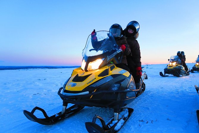 Snowmobile Safari to Lapland viewpoint - Frozen-lake coffee, Swedish Fika, and the ice fishing try