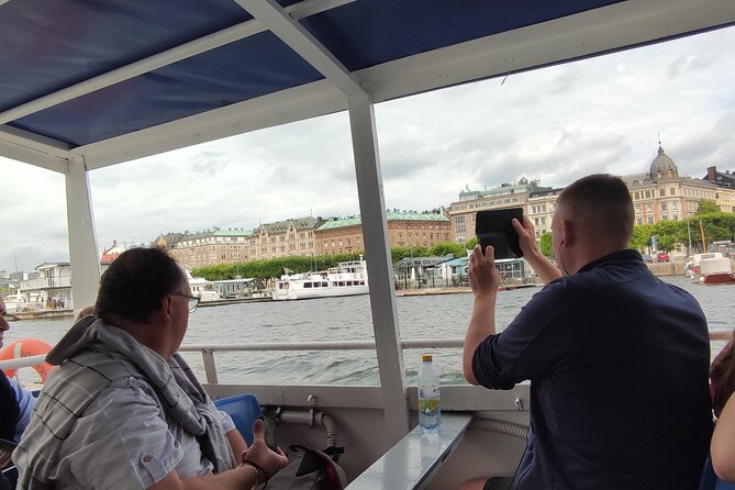 Stockholm- A Beauty On The Water: Old Town Walking Tour and Boat Trip Combined - Slottsbacken and the Royal Palace grounds, plus the Carl XIV Johan angle
