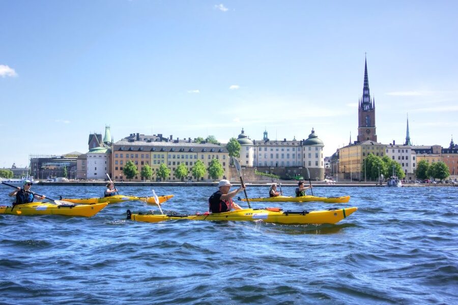 Stockholm: Guided Kayak City Tour & Optional Midsummer Meal - What You’ll See From the Water: Islands, Bridges, and City Hall Moments