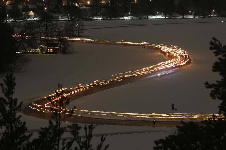 Stockholm: Ice Skating with fire & chance of Northern Lights - Your first lap with the guide: torch route, safety checks, and confidence