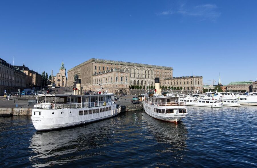 Stockholm: Old Town Walking Tour w/ Vasa Museum & Boat Ride - Old Town alleys: Royal Palace, Stortorget, Nobel Prize Museum, and the Runestone
