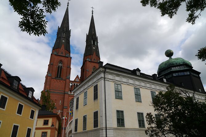 Uppsala Must See 2h city walk - 2h tour of all big attractions! - Uppsala Cathedral exterior and Viking runestones, close enough to connect