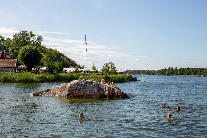 Vaxholm Day Trip From Stockholm: Cruise, Fortress, Swedish Fika - Stop 2: Vaxholm town walk, fishermen-red houses, and a City Hall peek