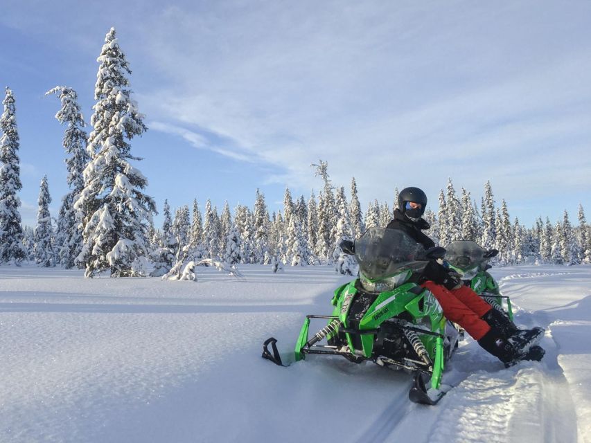 Wilderness Tour with Snowmobile & Ice Fishing - The guided snowmobile route: frozen lakes, forests, and wildlife track time